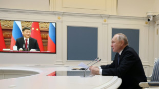 Putin tells Xi he wants to ramp up military cooperation 