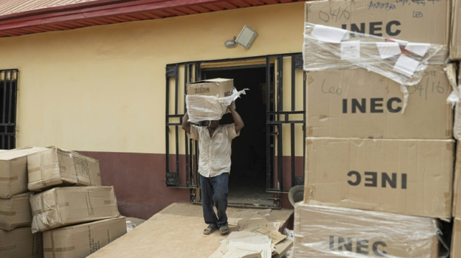 Nigerians vote for new president in closely fought election