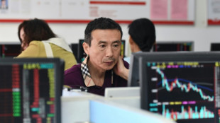 Asian markets track Wall St record as Hong Kong, Shanghai stabilise