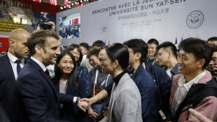 'Young and energetic' Macron wins Chinese fans