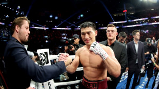 Bivol stuns 'Canelo' Alvarez to retain WBA light heavyweight title 