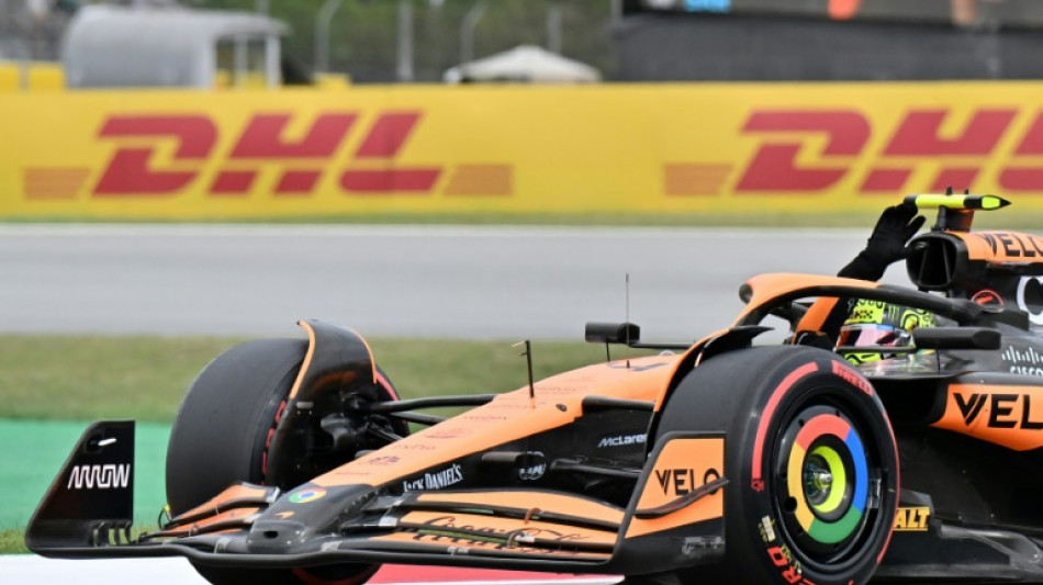 Norris shrugs off McLaren fire to nab Spanish pole after 'best ever lap'