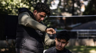 Barber tidies up in Turkey quake tent camp