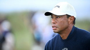 Woods determined to fight on despite worst ever British Open