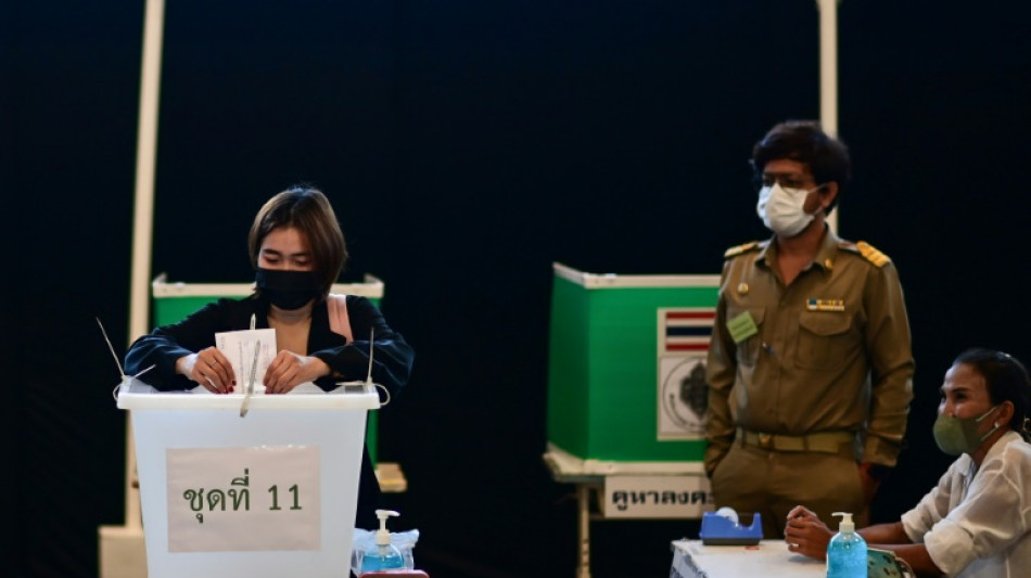 Thais queue at temples, schools as early voting begins