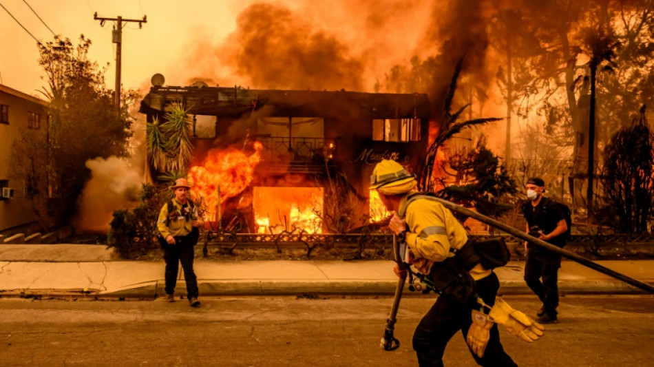 Los Angeles fires rage on as US National Guard called in 