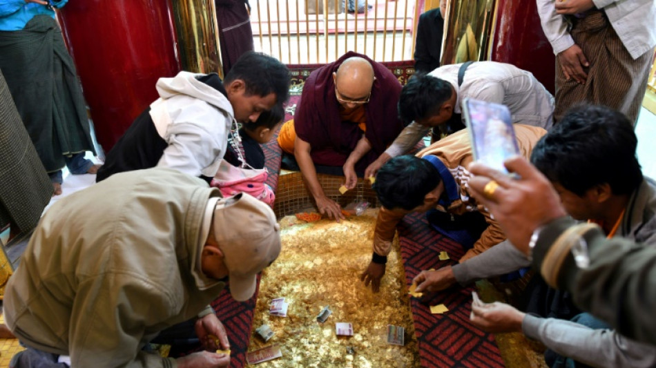 Myanmar pilgrims return to Buddha's golden footprints