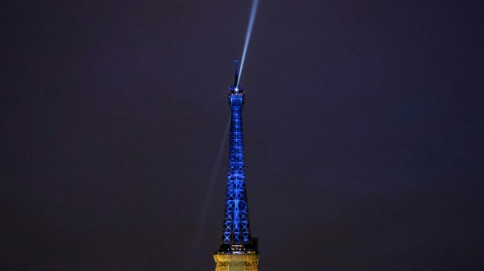 Eiffel Tower lights up in Ukraine colours