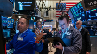 Dow soars to fresh record while gold prices hit all-time high