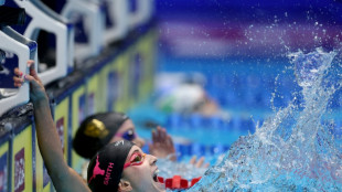 Regan Smith clocks 100m backstroke world record of 57.13 in US trials win