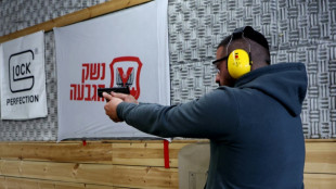 Fearing Palestinian attacks, Israelis seek security in guns