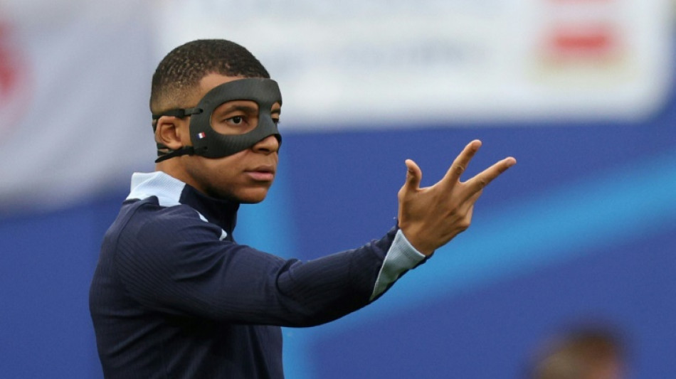 Masked Mbappe on French bench as Ukraine claim first Euro 2024 win