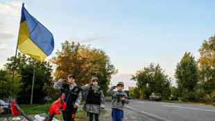 'Checking for Russians': Children play war on Ukraine's roads