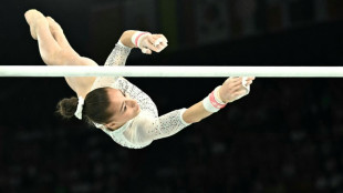 After France split, Nemour wins gymnastics Olympic gold for Algeria