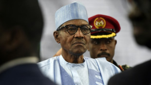 Nigeria's departing President Buhari defends legacy