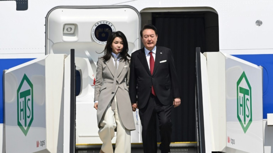 South Korea president arrives in Japan to open 'new chapter'