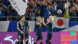 Japan hammer China, Australia stunned in World Cup qualifiers