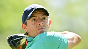 McIlroy charges but Clark clings to Canadian Open lead