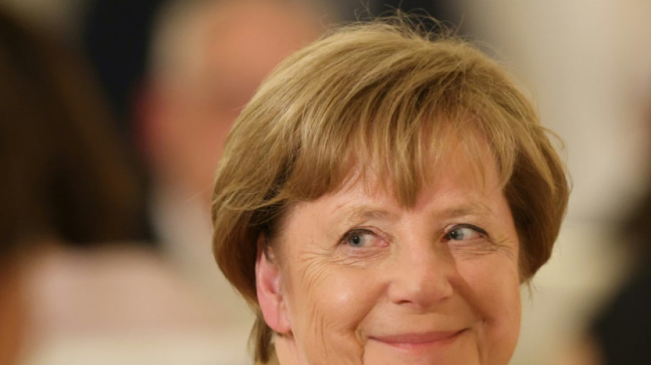 Merkel décorée de la plus haute distinction allemande malgré un bilan critiqué