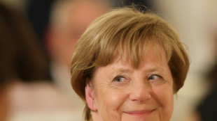 Merkel décorée de la plus haute distinction allemande malgré un bilan critiqué