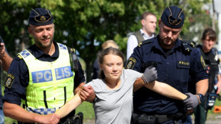 Police remove Greta Thunberg from protest hours after fine