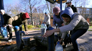 Kyiv residents 'get by' after Russian strikes cut water and power