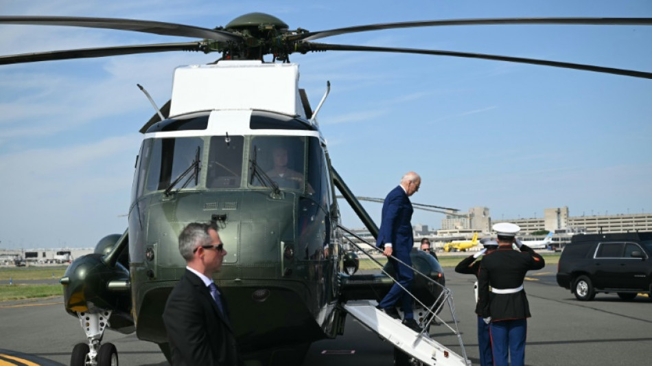 Biden hits campaign trail, visits Black church as pressure mounts