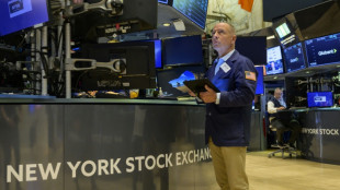 Wall Street ouvre en baisse, pause avant le compte-rendu de la Fed