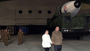 Kim oversees N. Korea's ICBM launch with daughter in tow