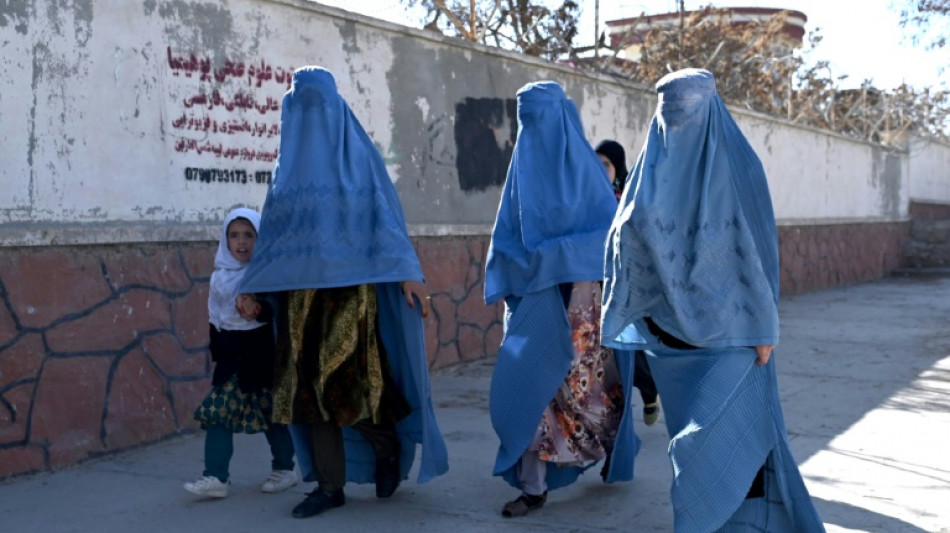 Taliban order NGOs to stop women staff from working over 'hijab'