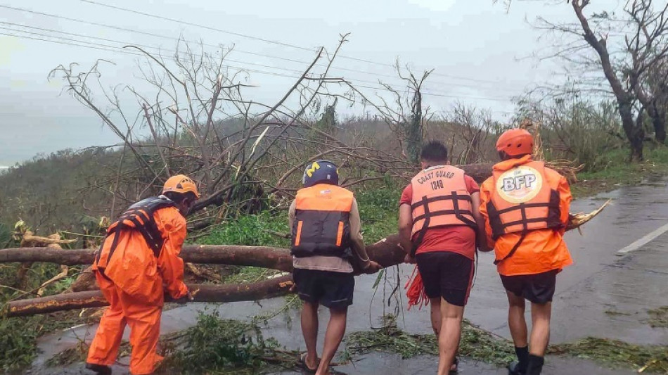 Philippines cleans up as typhoon death toll rises