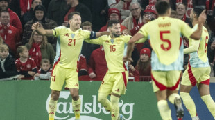 Spain beat Denmark to seal Nations League group win