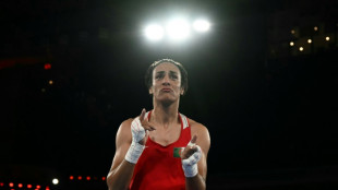 Gender row boxer wins Olympic gold as US fly and flop in sprint relays 