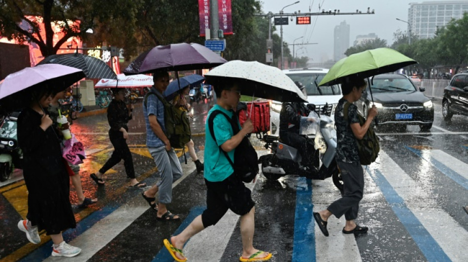 En Chine, des pluies torrentielles font au moins 30 morts, canicule à Shanghai